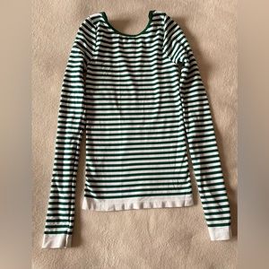 Intimately top with enticing open back